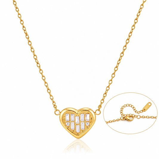 Gold heart  waterproof 
pendant necklace with clear rectangular baguette stones, shown on a white background with an inset detail of the clasp and extender chain.